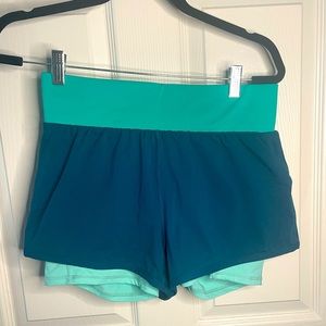 Fabletics shorts over biker shorts